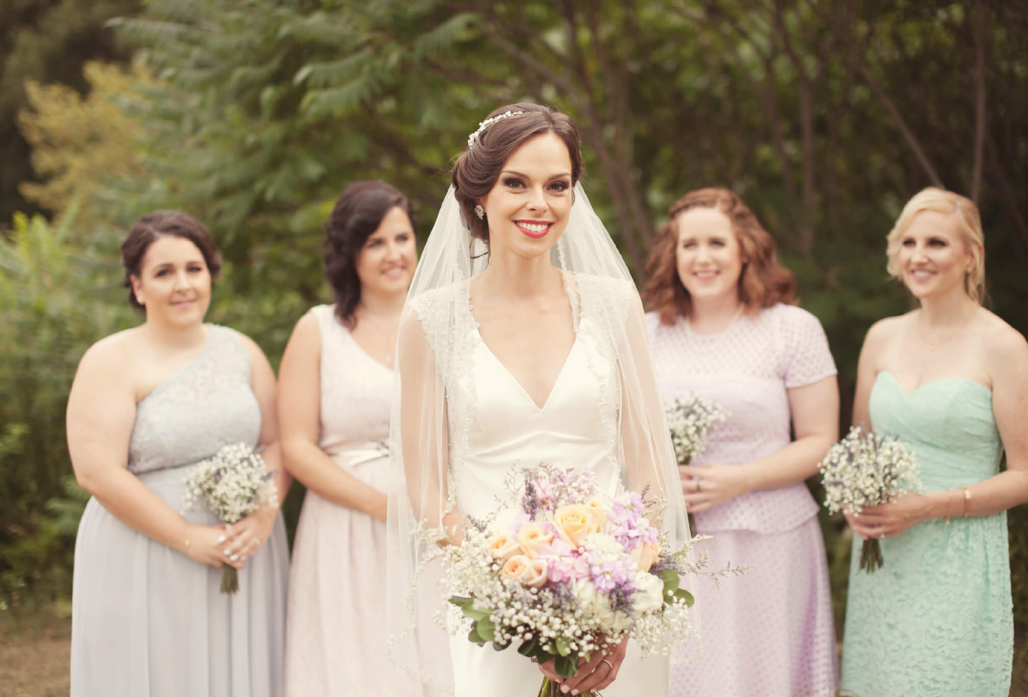 bride and bridesmaids mixed match dresses