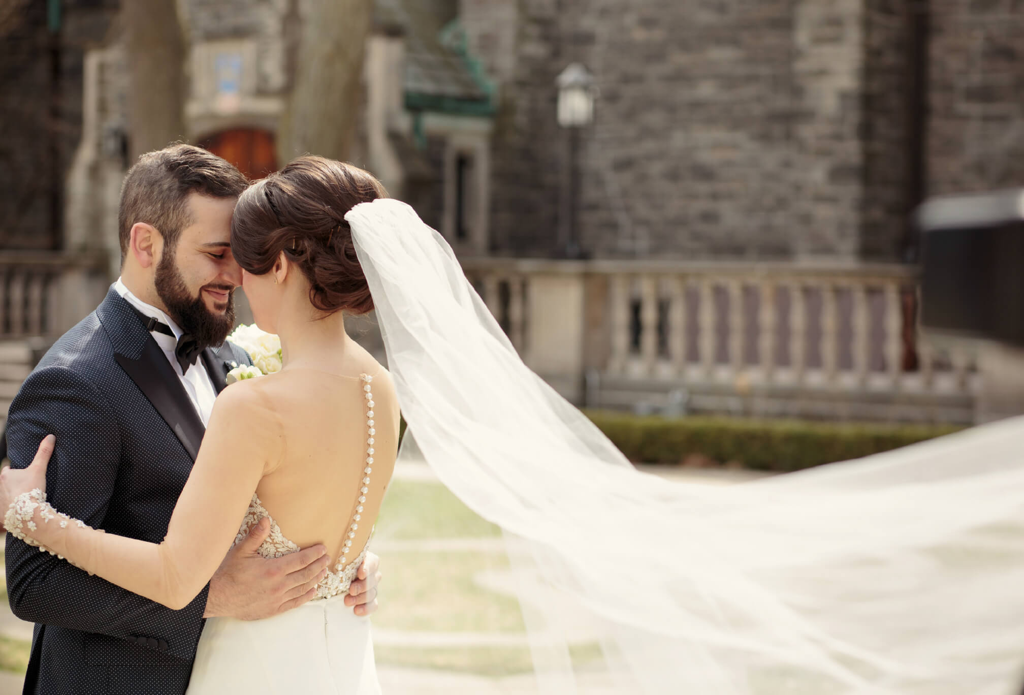 bride and groom at trinity college toronto