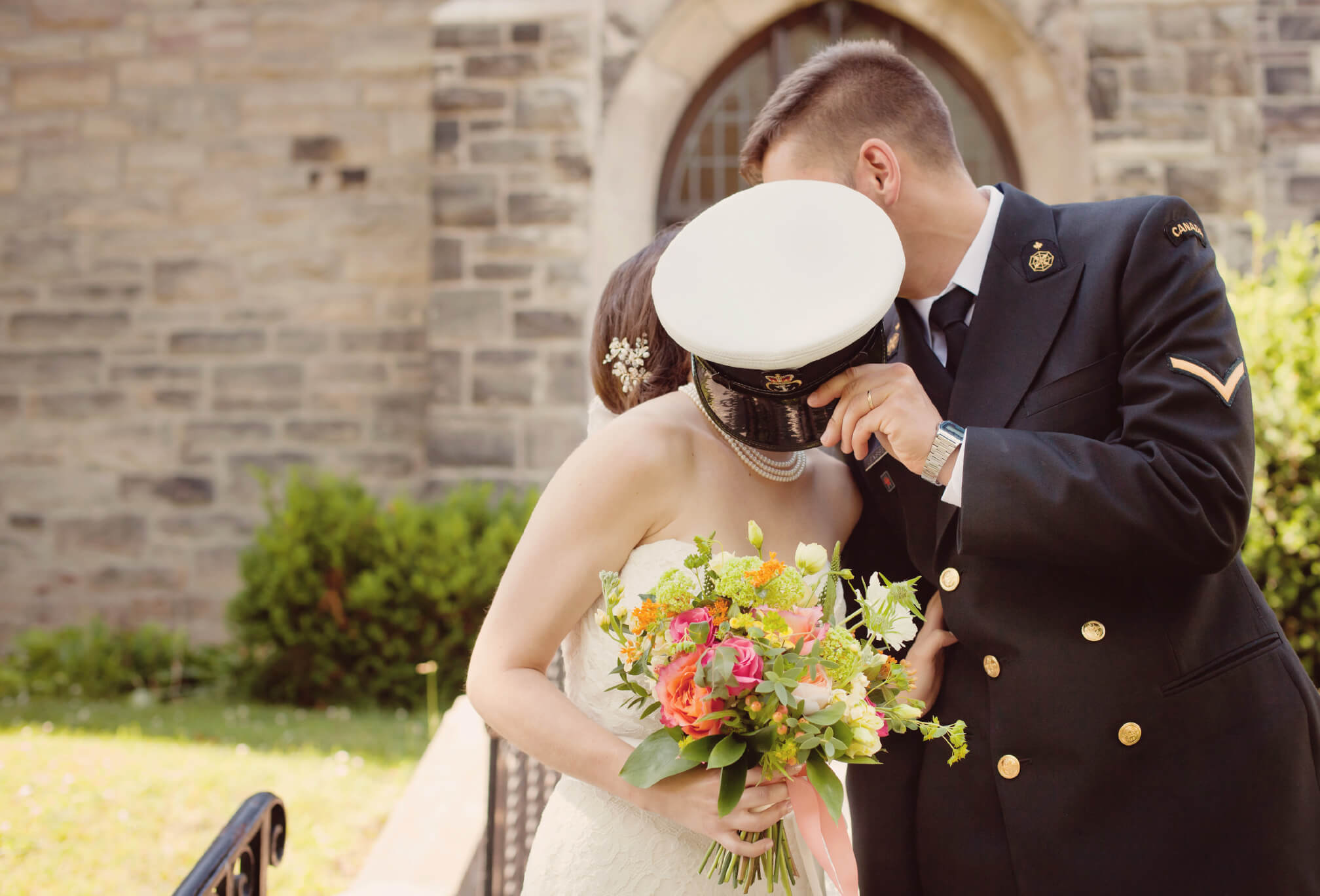 bride and groom in navy uniform