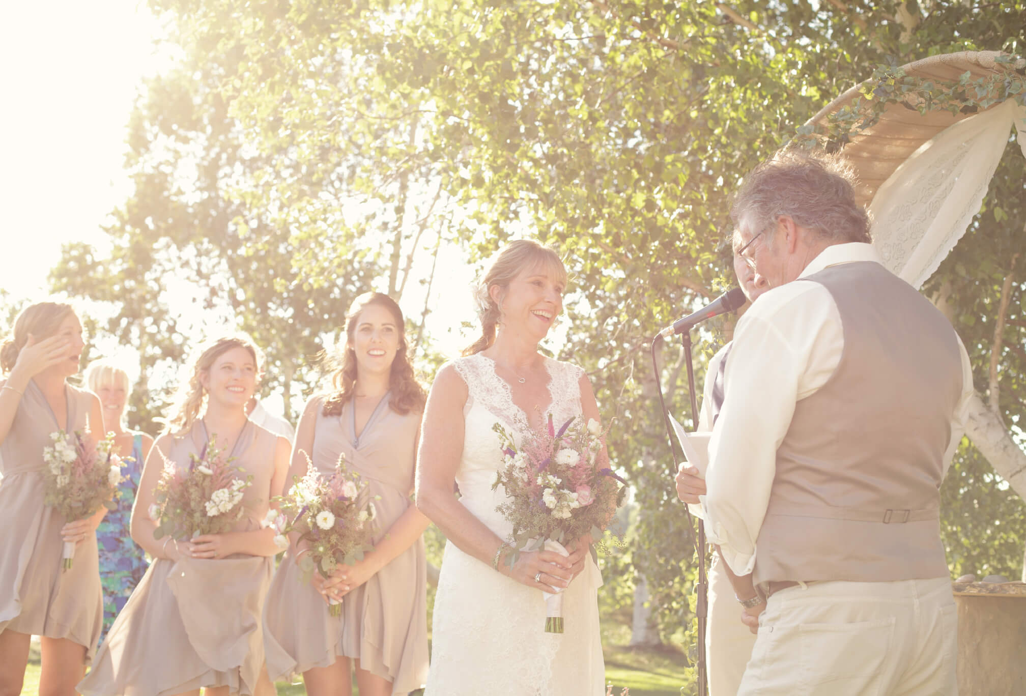 outdoor ceremony among birch trees
